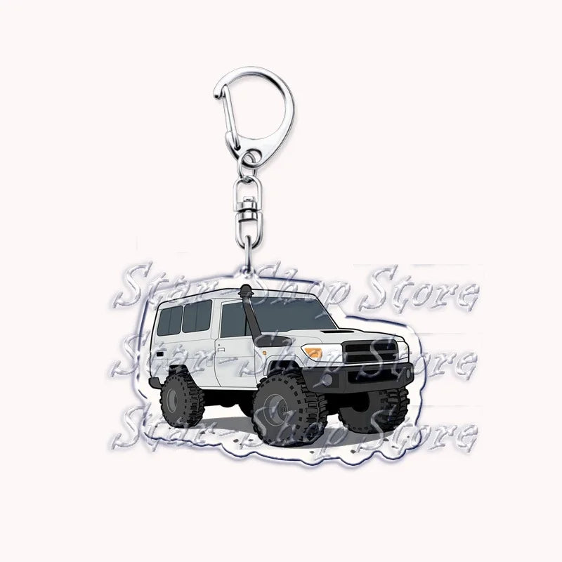 Silver acrylic keychain featuring a white off-road truck model.