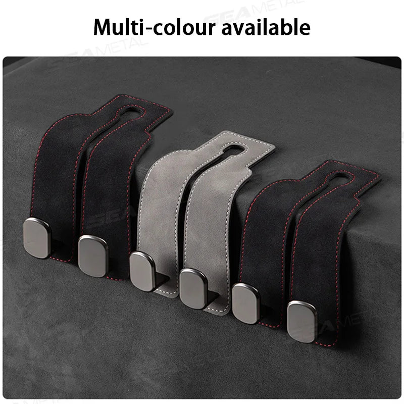 Multi-colour durable suede car seat back storage hooks displayed on a dark fabric.