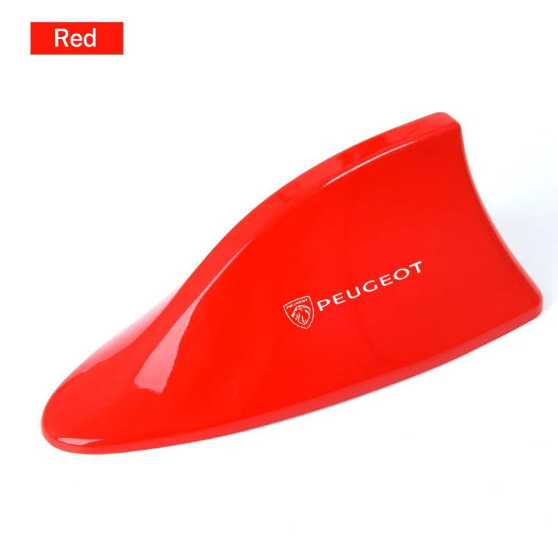 Red shark fin antenna for a Peugeot roof