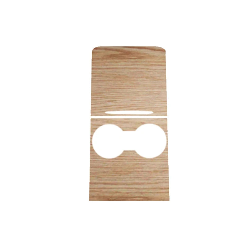 A light wood grain dashboard cover for a Tesla Model Y featuring a cutout design.