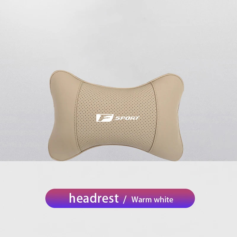 A beige ergonomic neck pillow with a textured surface and an F Sport logo detail.