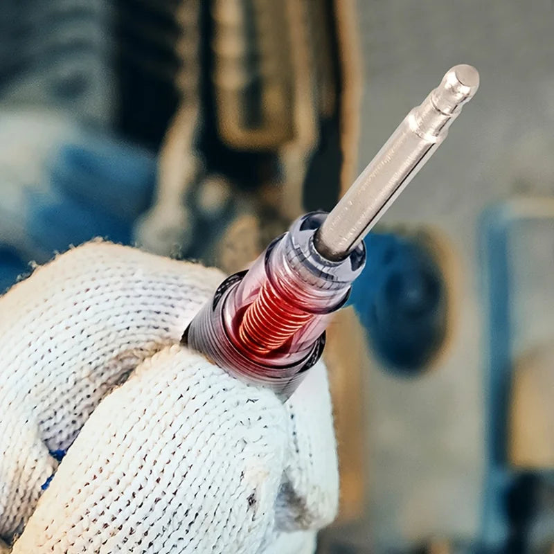 A hand wearing a white glove holds an automotive spark plug ignition tester kit with a metal probe.