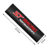 Black carbon fiber racing seat belt shoulder pad cover with red lettering