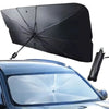 A black portable car sun shade umbrella is shown angled over a blue car's windshield.