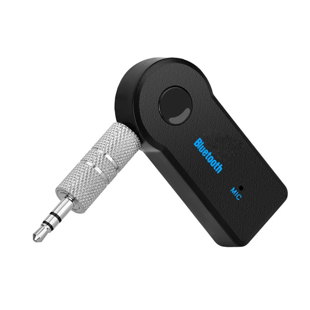 Adaptateur audio Bluetooth noir avec connecteur argenté et voyant lumineux.