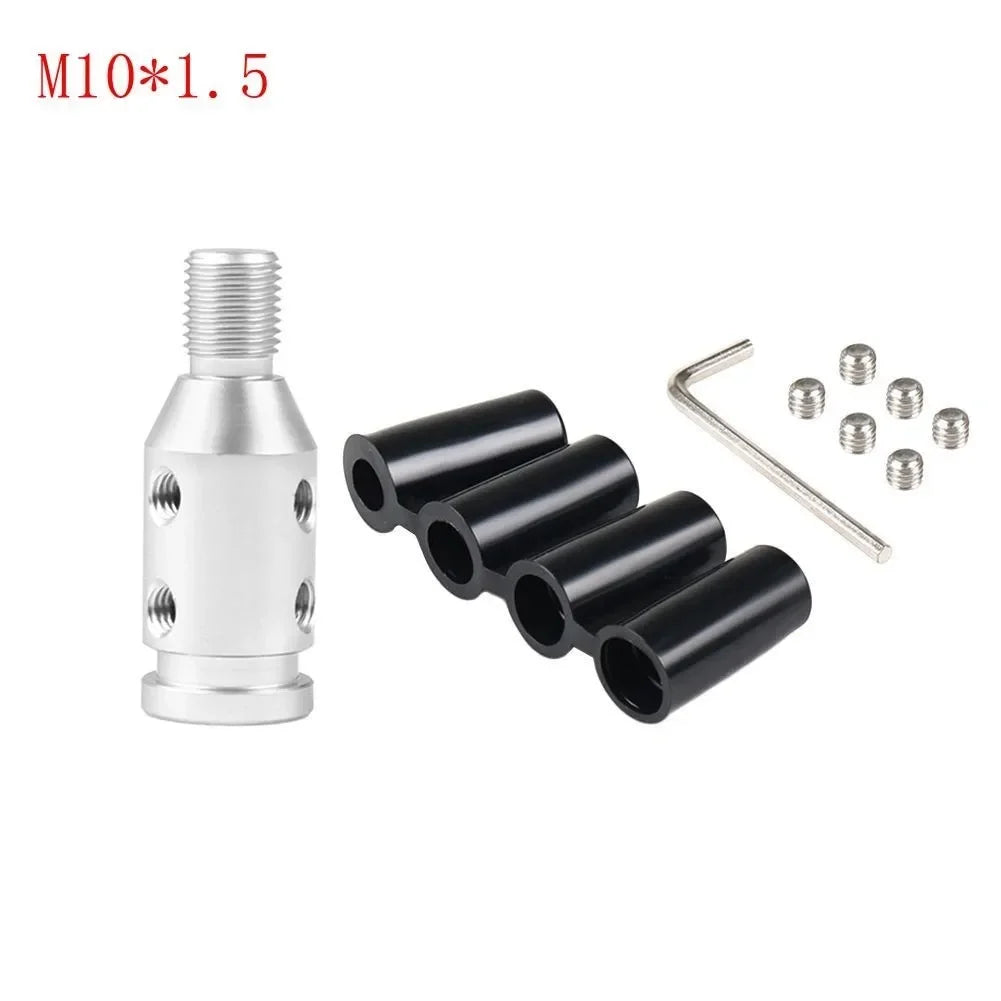 Silver M10x1.5 threaded adapter and several black cylindrical components for a gear shift knob.