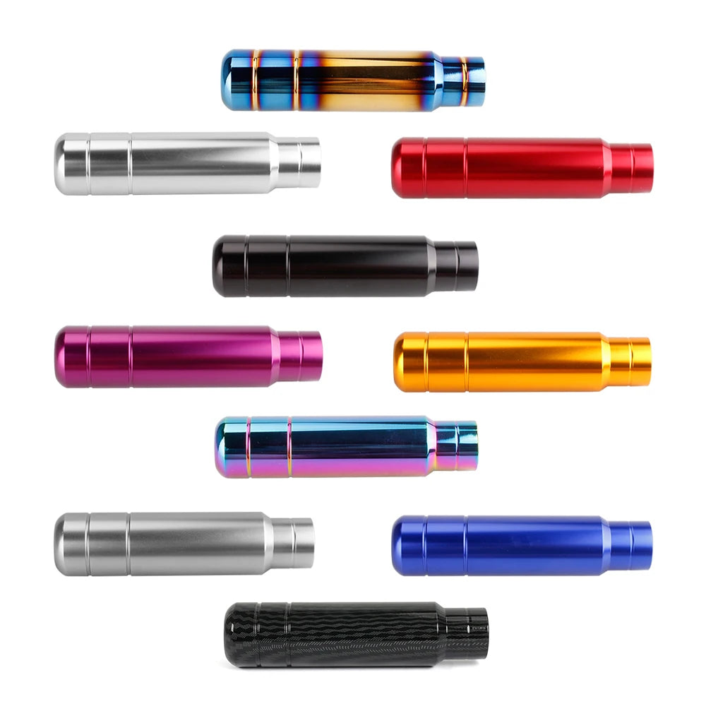A collection of various JDM style aluminum gear shift knobs in different colors including blue, orange, red, silver, and blac