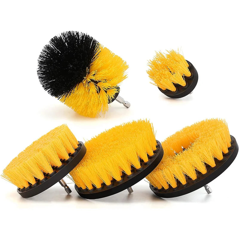 A set of yellow and black cleaning brushes, including a round brush and flat brushes.