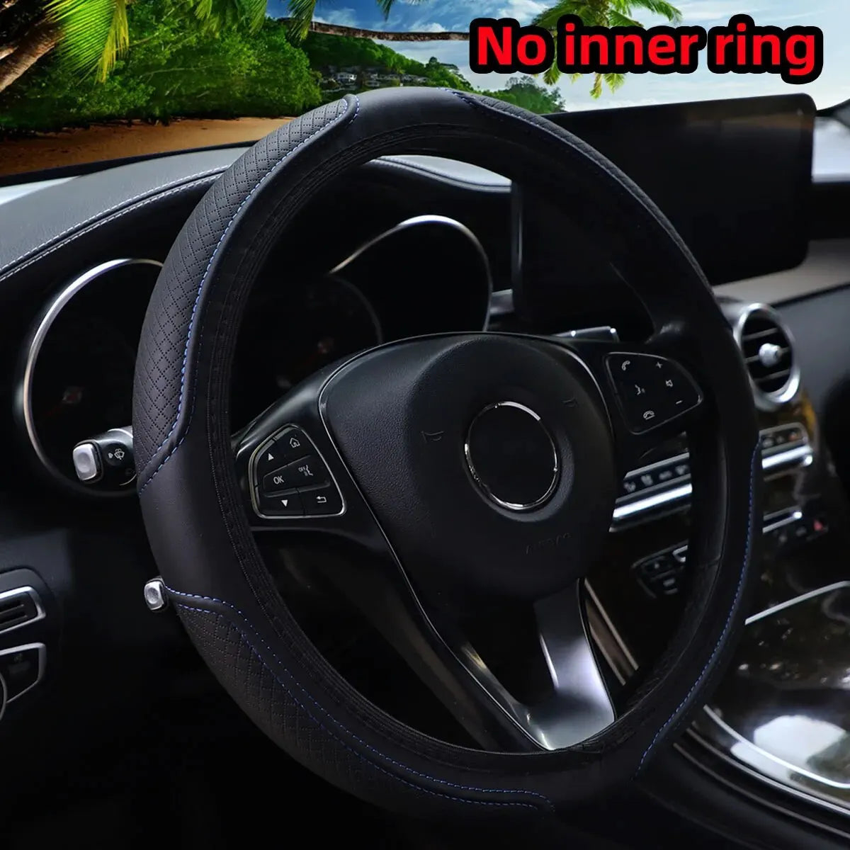 Black embossed leather steering wheel cover with blue stitching shown inside a car