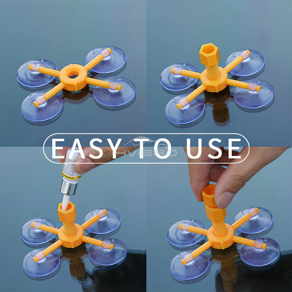 Kit profesional de reparación de parabrisas con herramientas de plástico naranja y discos adhesivos azules.