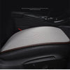 A close-up view of a black car seat with a gray breathable ice silk cushion installed.