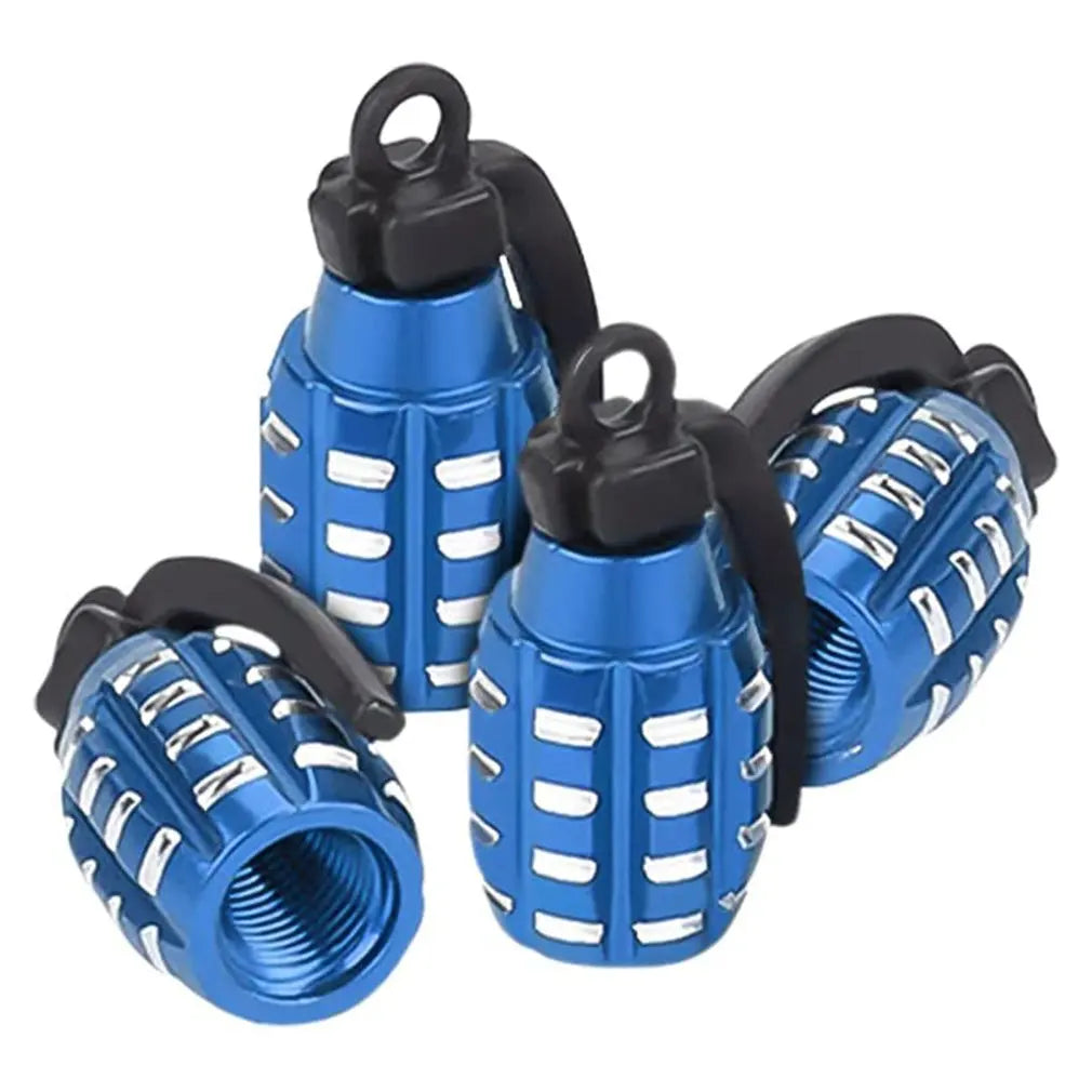 A set of four blue and black aluminum tire valve caps for automotive use.