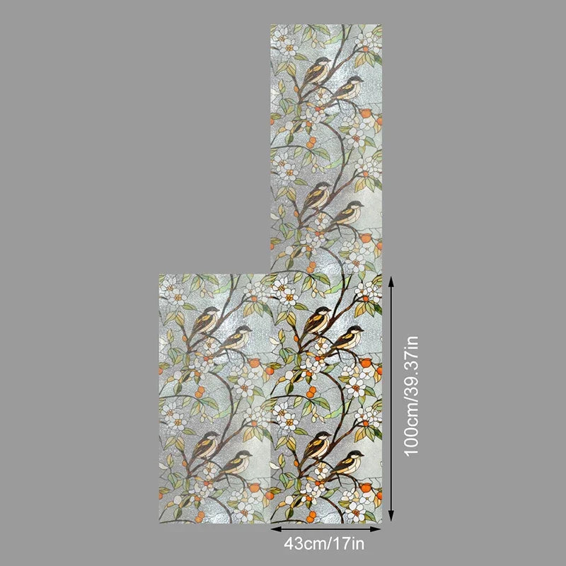 Vertical sheet of decorative PVC stained glass window film featuring leaves and small birds on a light background