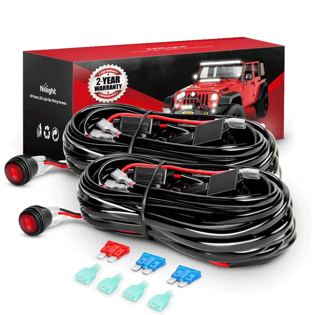 Une boîte et un kit de câblage LED noir enroulé avec divers connecteurs sur fond blanc.
