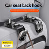 A close-up of a black car seat back hook organizer attached to a white car seat, highlighting its fold-away and scalable desi