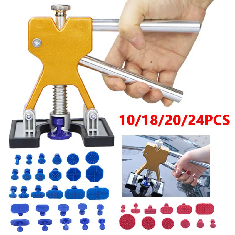A set of professional car dent repair pullers and tools including various sized metal and plastic attachments.