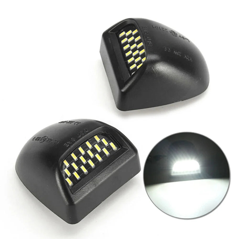 A black high brightness 18 LED license plate light assembly with a clear lens.
