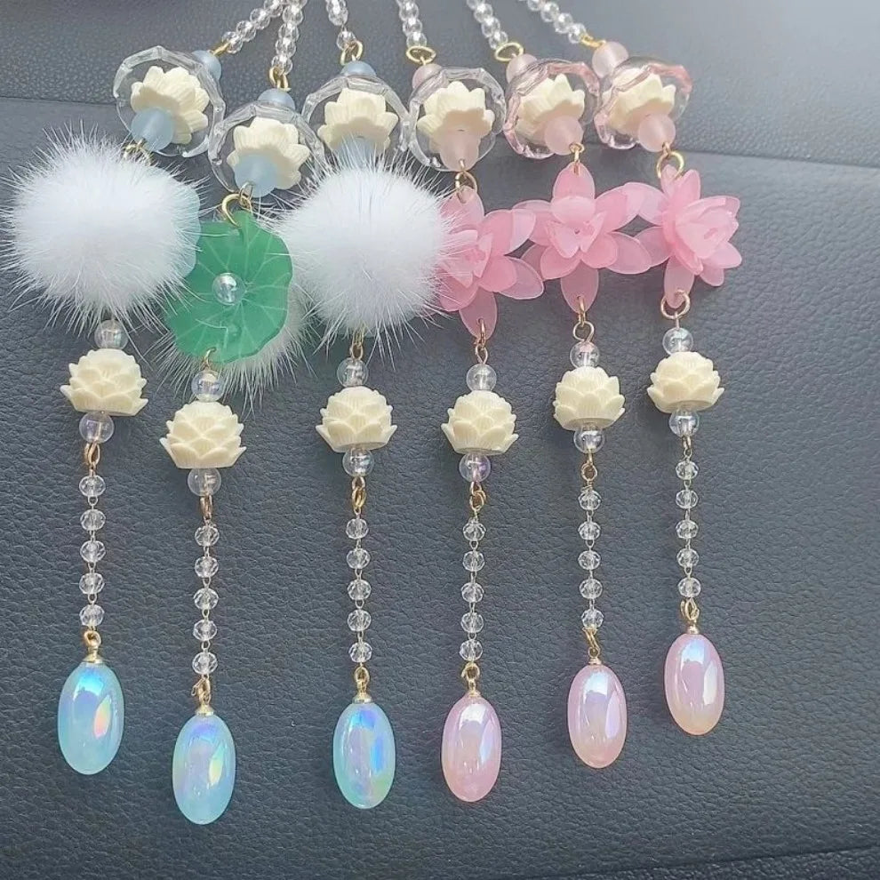 Pink lotus car pendant ornament featuring white and pink floral elements with clear crystal drops