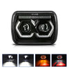 A black square LED headlight with an integrated turn signal and a diamond-cut lens design.