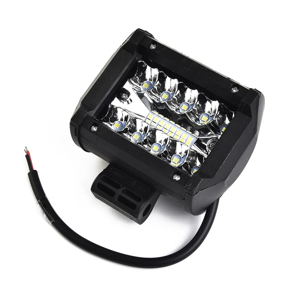 Black high-intensity LED off-road flood bar with a flexible cable attached