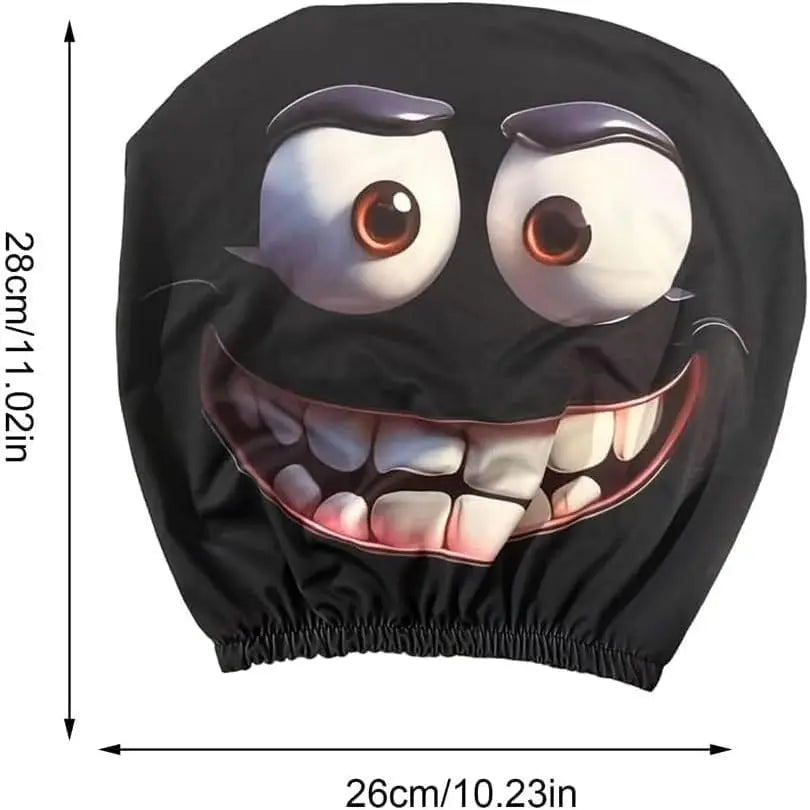 Funda para reposacabezas de coche negra con cara de dibujos animados y ojos grandes sonrientes.
