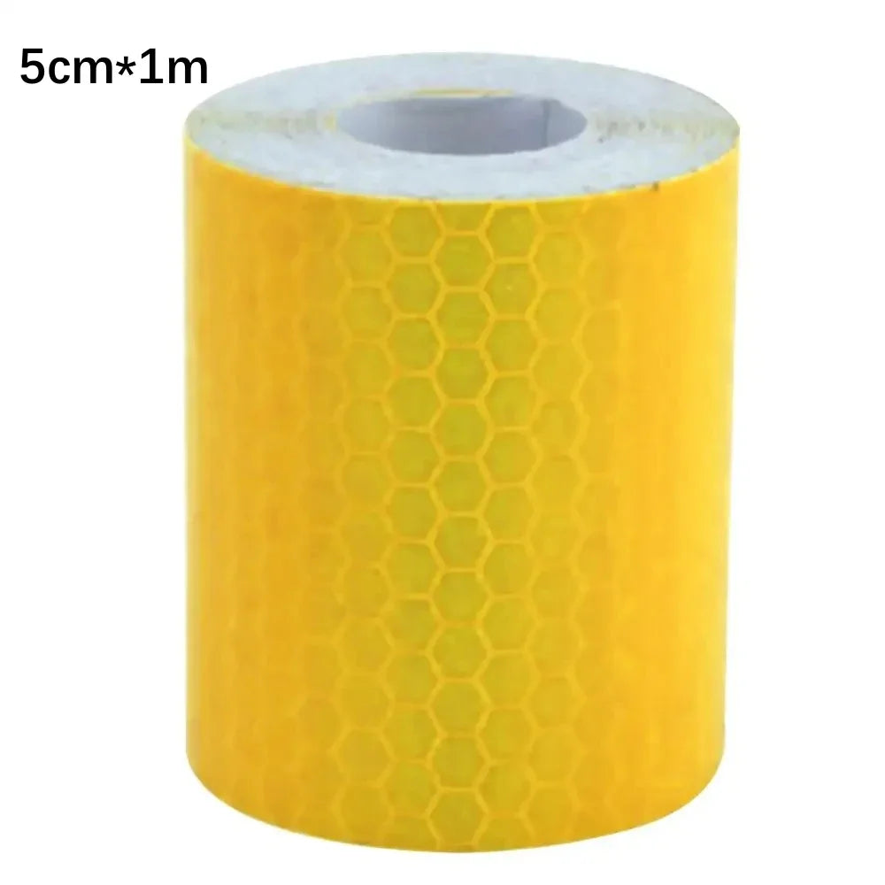 A roll of 5cm by 1m high-visibility yellow reflective tape for vehicles.
