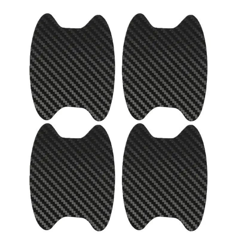 A set of car door handle protection film, black and carbon fiber patterned.