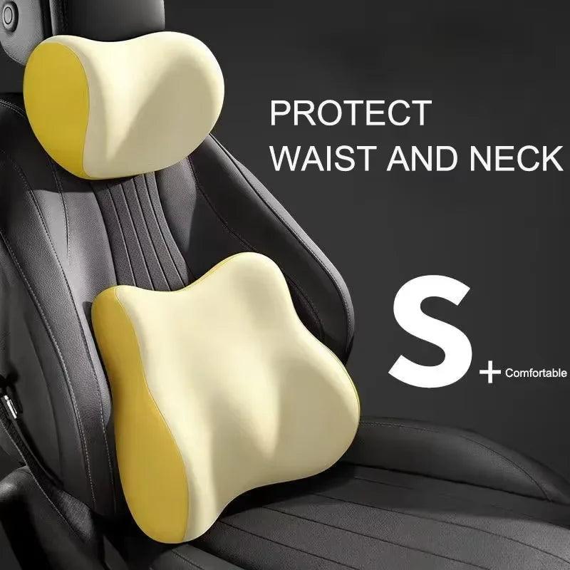 Close-up of a yellow memory foam support pillow placed on a black car seat, designed to protect the waist and neck.