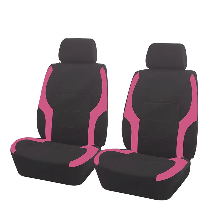 Ein Paar schwarze Autositzaufzieher mit rosa Akzenten nebeneinander