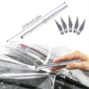 A hand is using a professional window tint installation tool to apply a film to a car window.