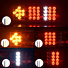 Close-up view of dual high-brightness truck tail lights illuminating various patterns and colors.