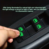 A hand presses a green button on a black car window decal, illustrating light storage and release.