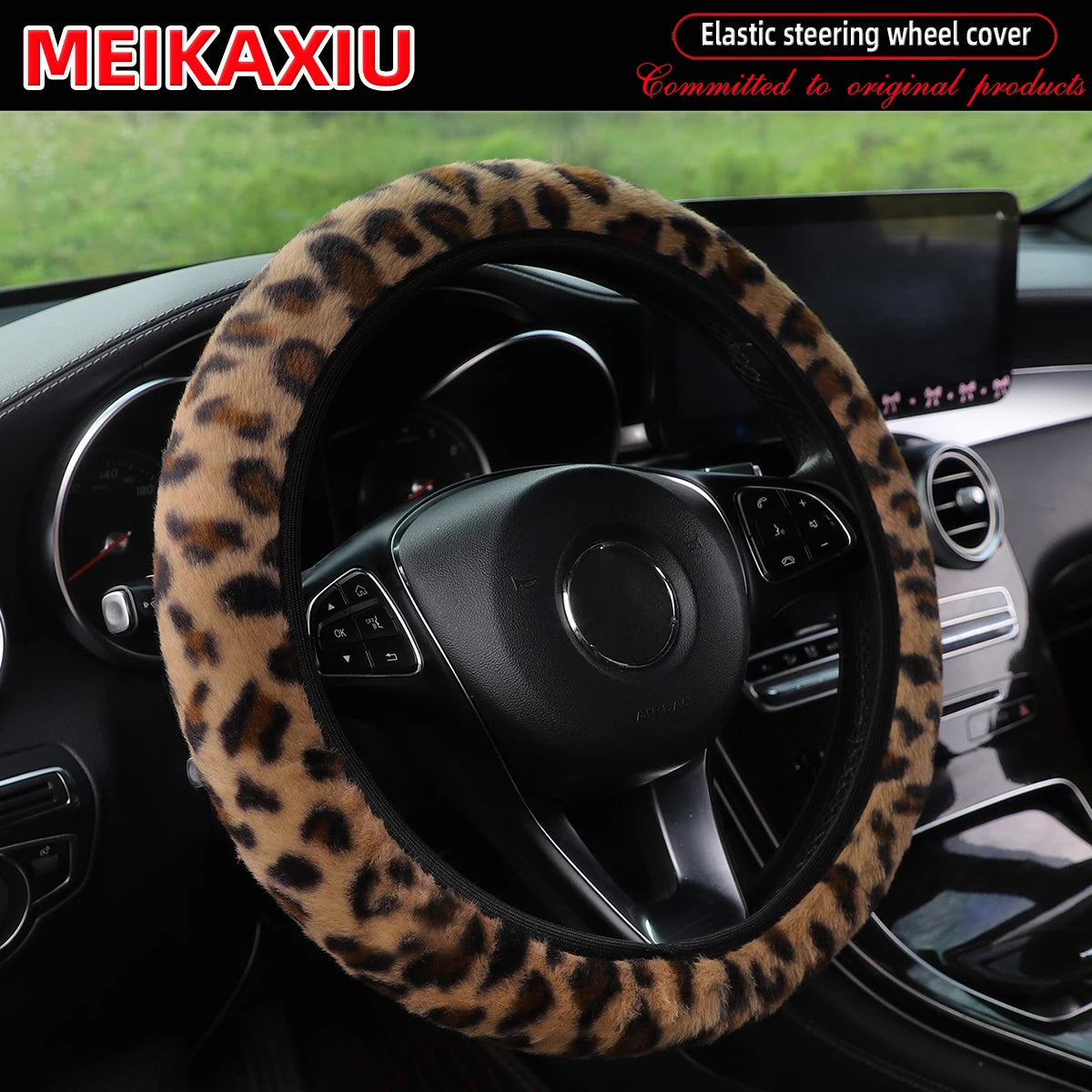 Leopard print plush steering wheel cover installed in a car interior.