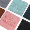 A collection of PU leather document organizers featuring car registration and insurance labels in various colors like gray, t