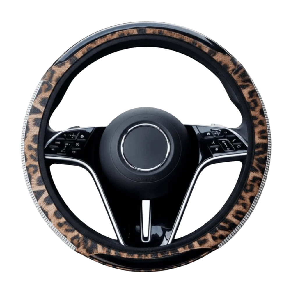 A black steering wheel covered in leopard print material with silver rhinestone accents.