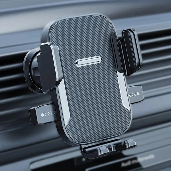 A black universal foldable car phone mount is shown mounted on a dark car grille.
