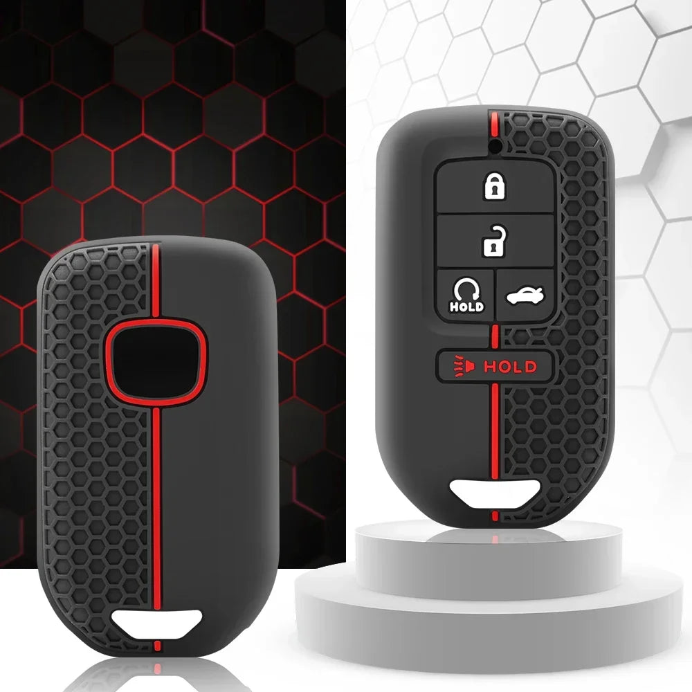 A black silicone car key cover with multiple buttons is displayed on a white stand.