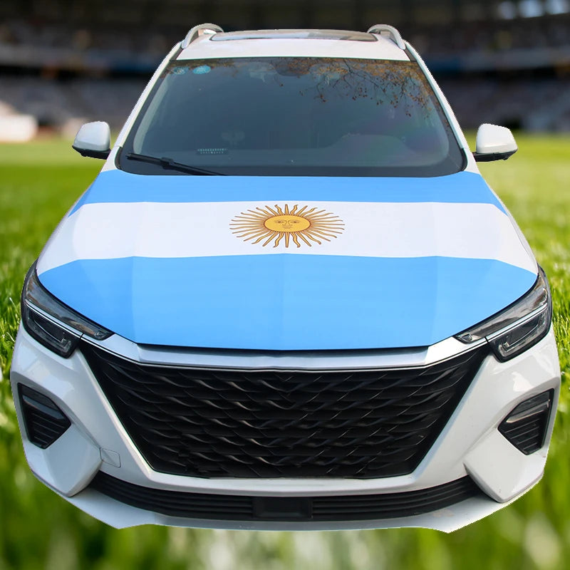 A white car with a flag design featuring the Mexican sun emblem on its hood.