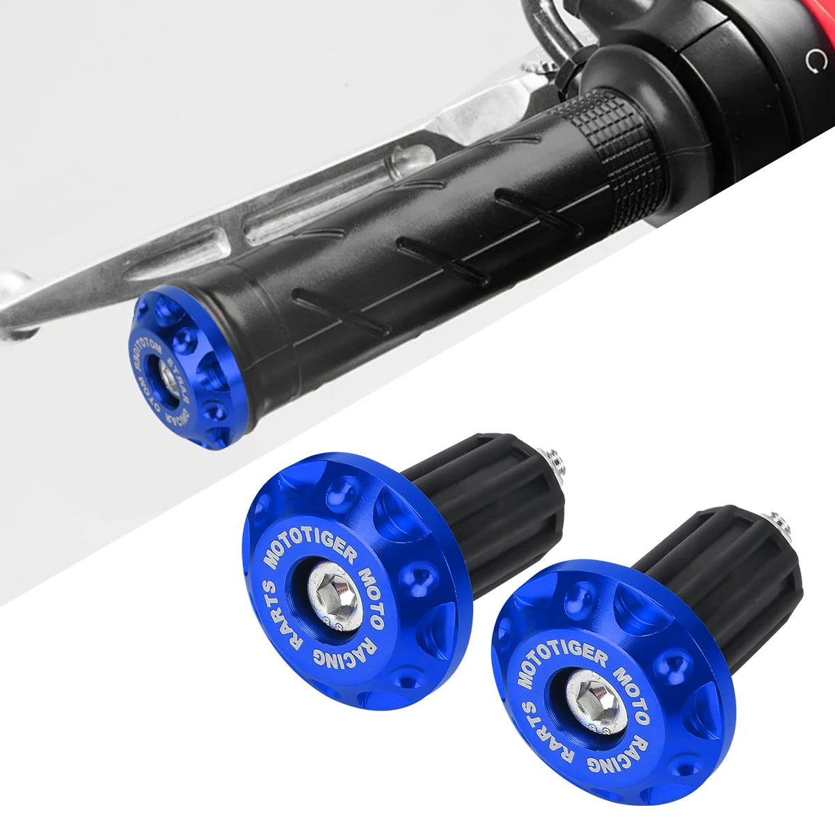 Close-up view of black motorcycle handle bar plug grips with blue accents and silver metal fittings.