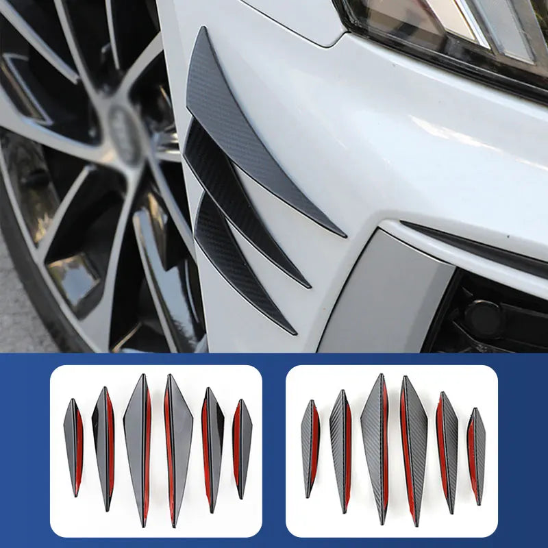 A collection of black and red universal car bumper lip spoiler fins for installation.