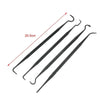 A set of seven black detailing brushes and picks for car cleaning.