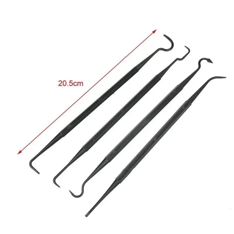A set of seven black detailing brushes and picks for car cleaning.