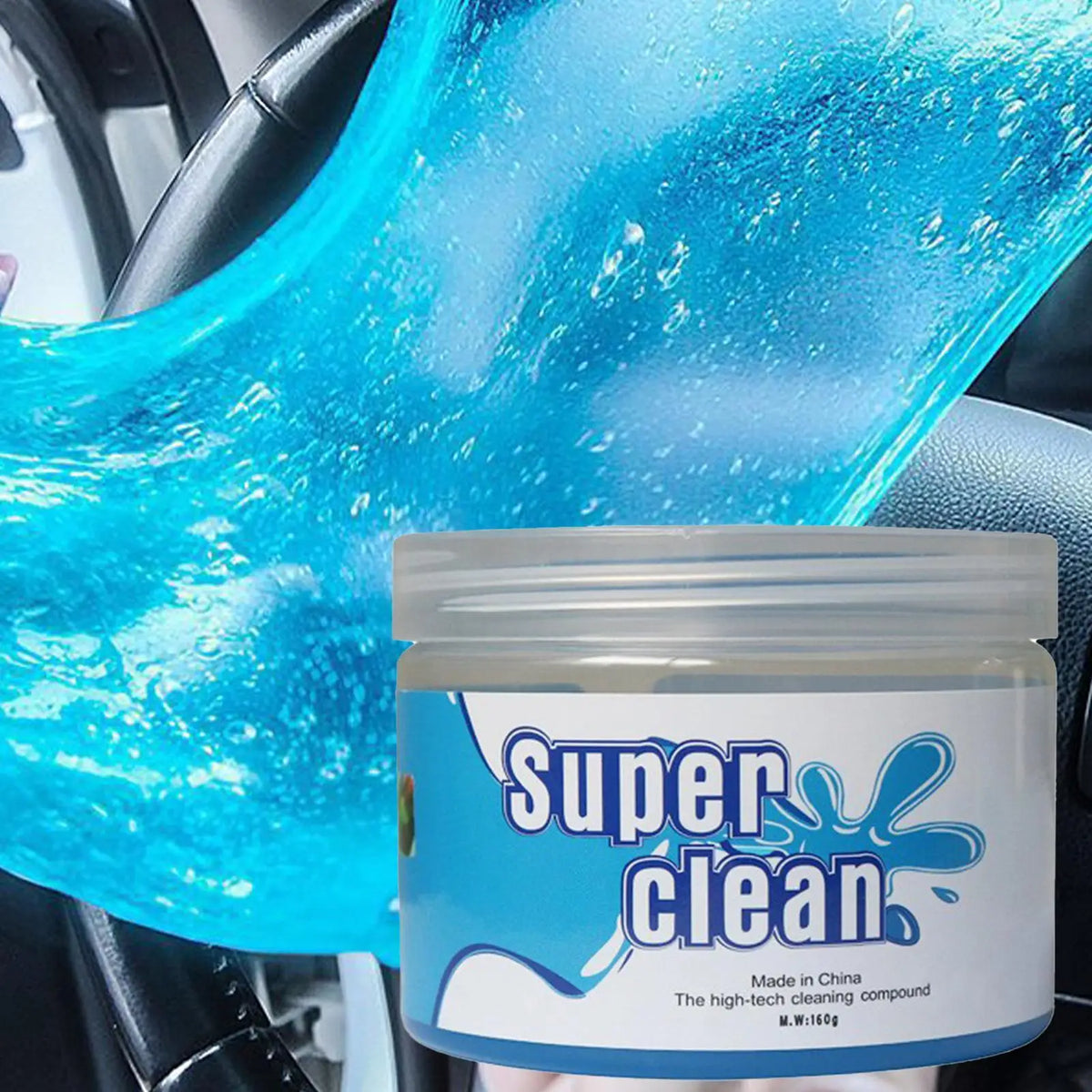 A jar of Super Clean cleaning compound is shown being used to clean a car interior surface.