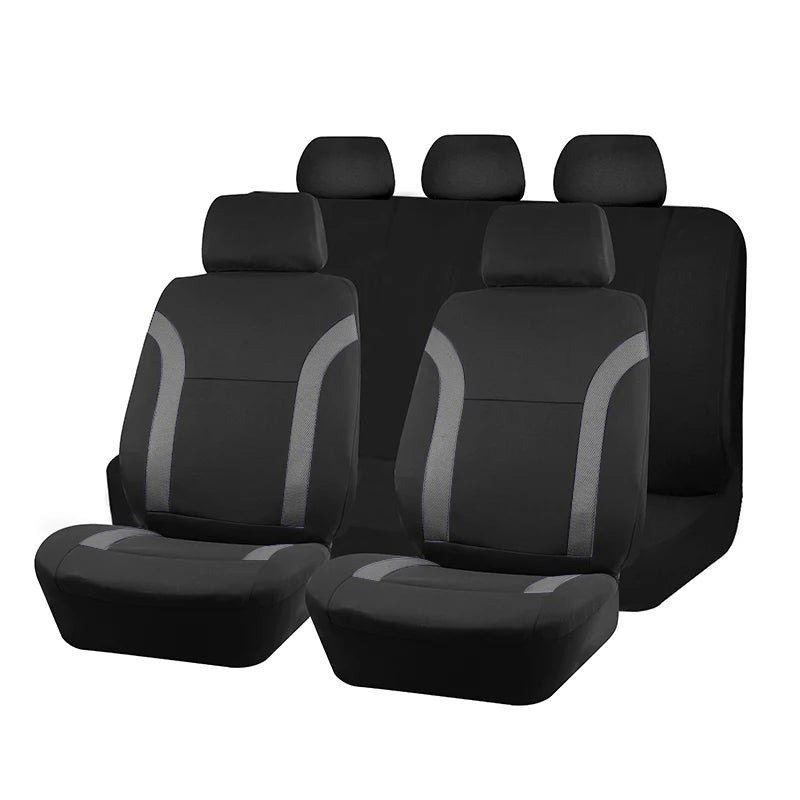 Ein Set schwarze universelle Auto-Sitzbezüge mit Kopfstützen in einer Reihe.