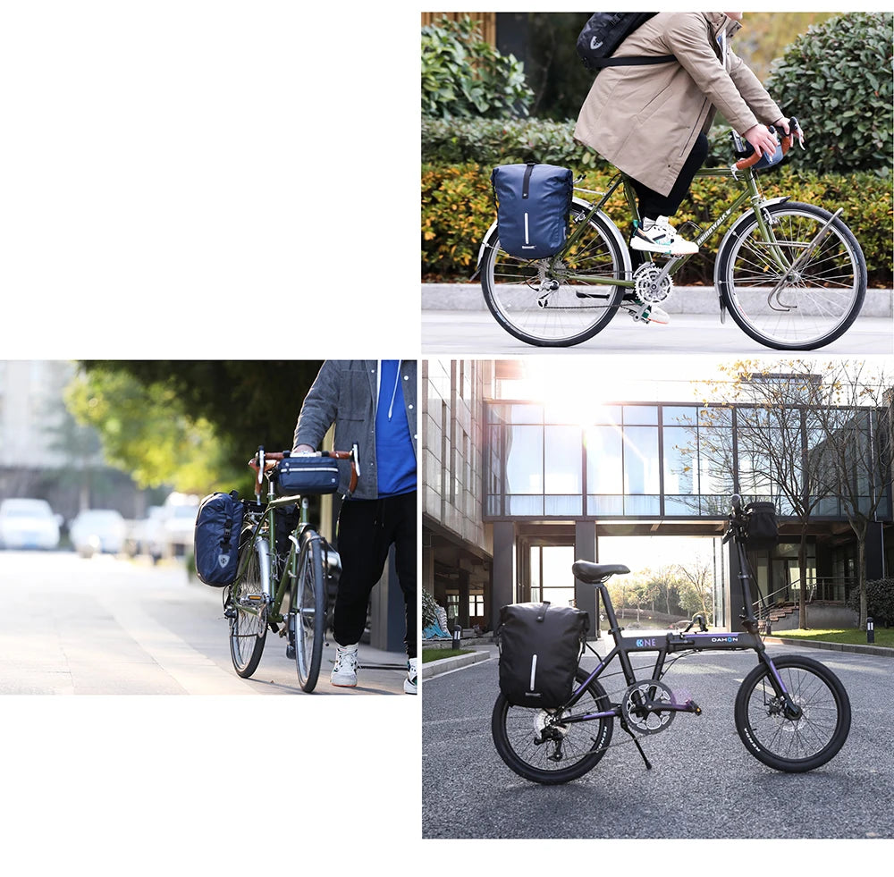 A person is riding a foldable bike with black pannier bags on the rear rack in an urban setting.
