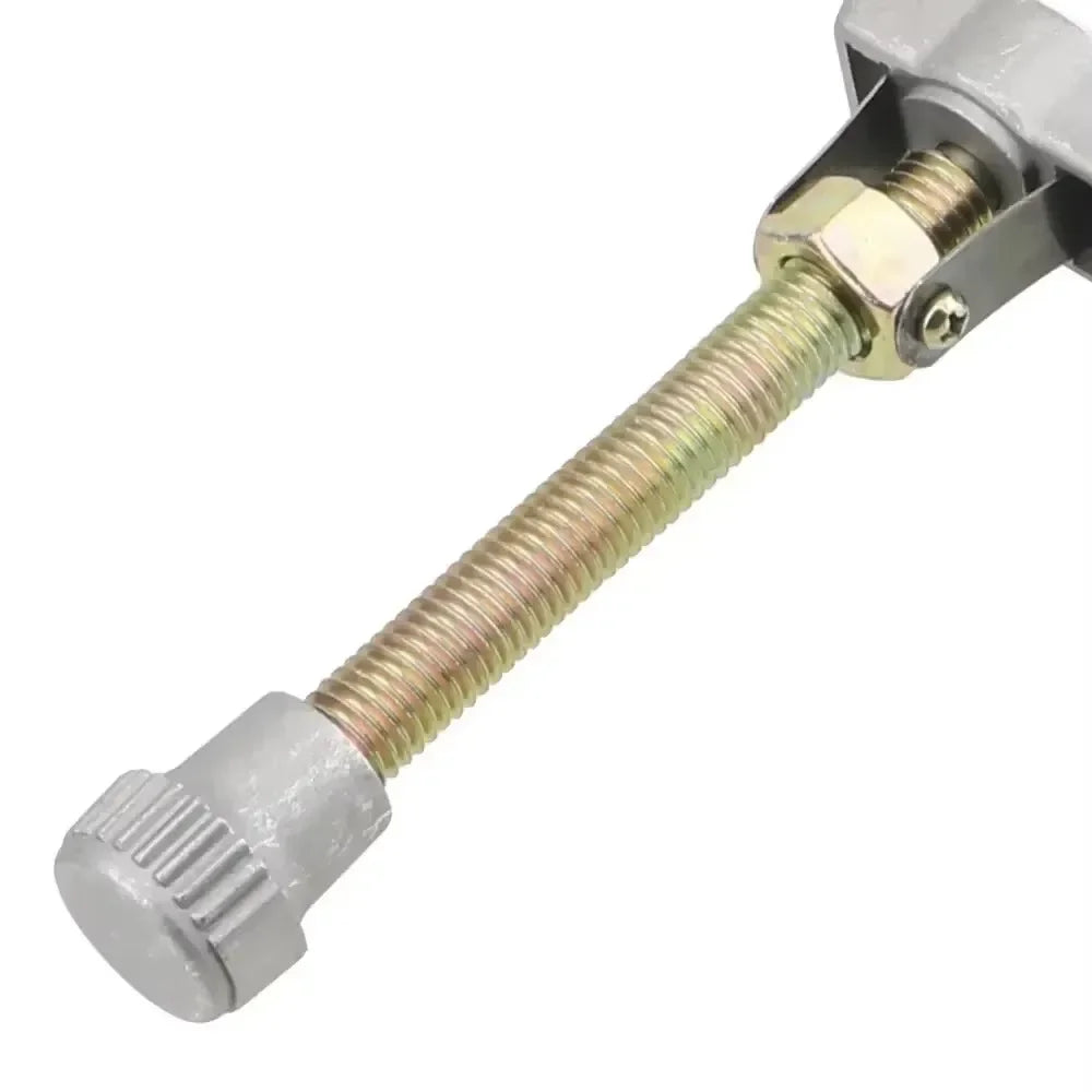 A metal tool used for removing auto oil filters, featuring a threaded shaft and a hexagonal fitting.