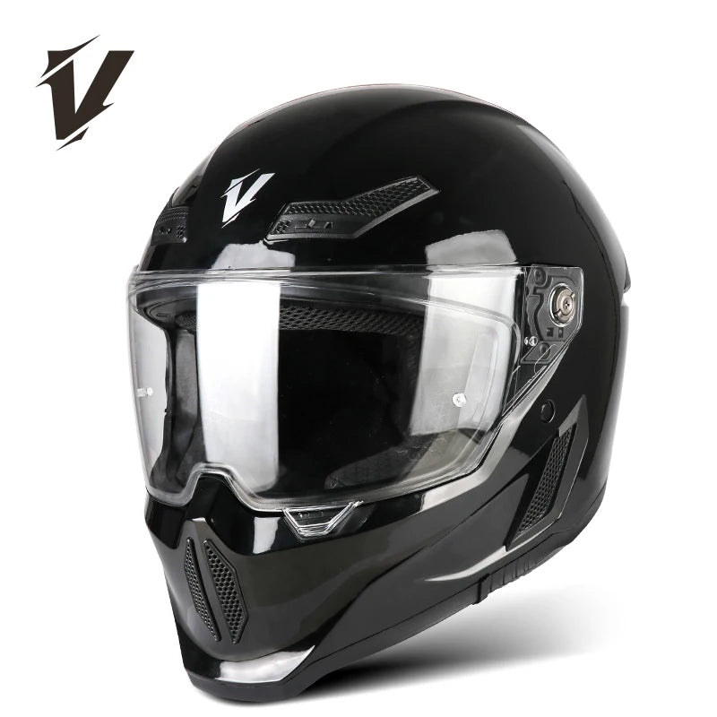 Casco de motocicleta negro con visor transparente y detalles de ventilación.