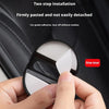 A hand is applying a two-step installation car grade adhesive to a protective cover for a car door lock.