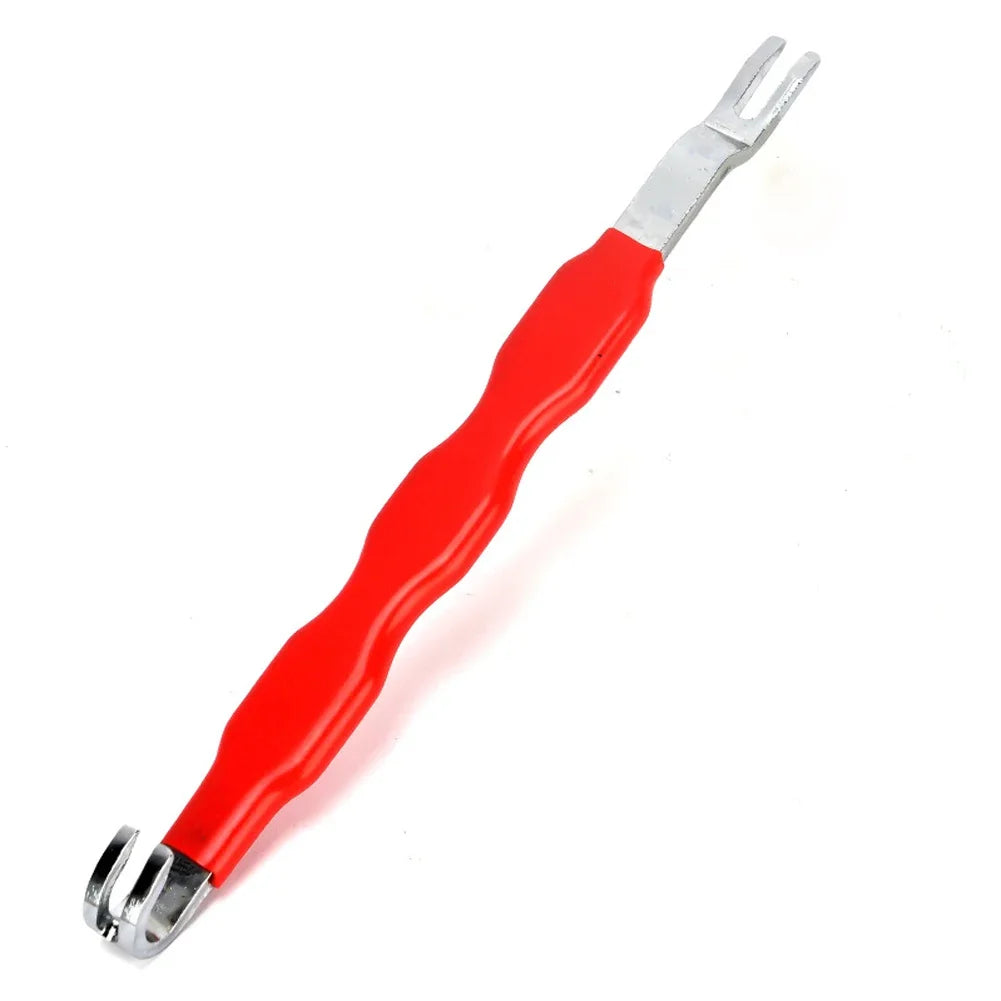 Herramienta de desconexión eléctrica automotriz roja y plateada con pinzas visibles.