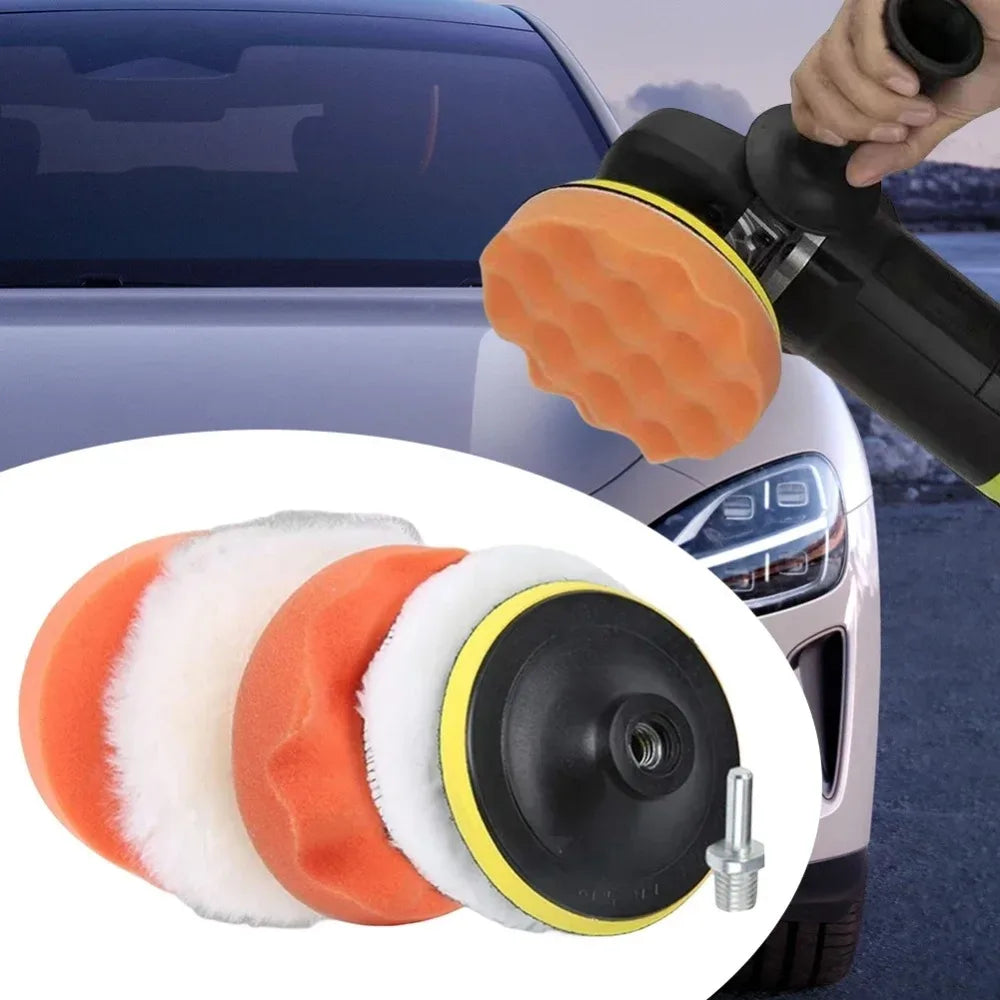A professional car polishing pad kit showing various orange and white foam pads and a black polishing disc.